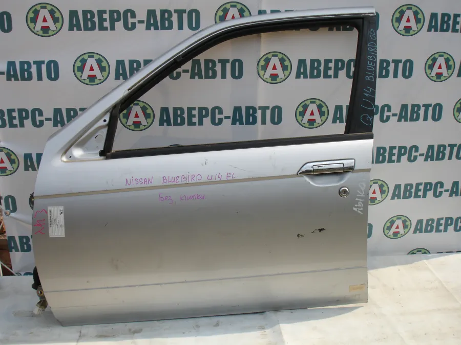 Дверь боковая левая передняя Nissan Bluebird EU14 серебро