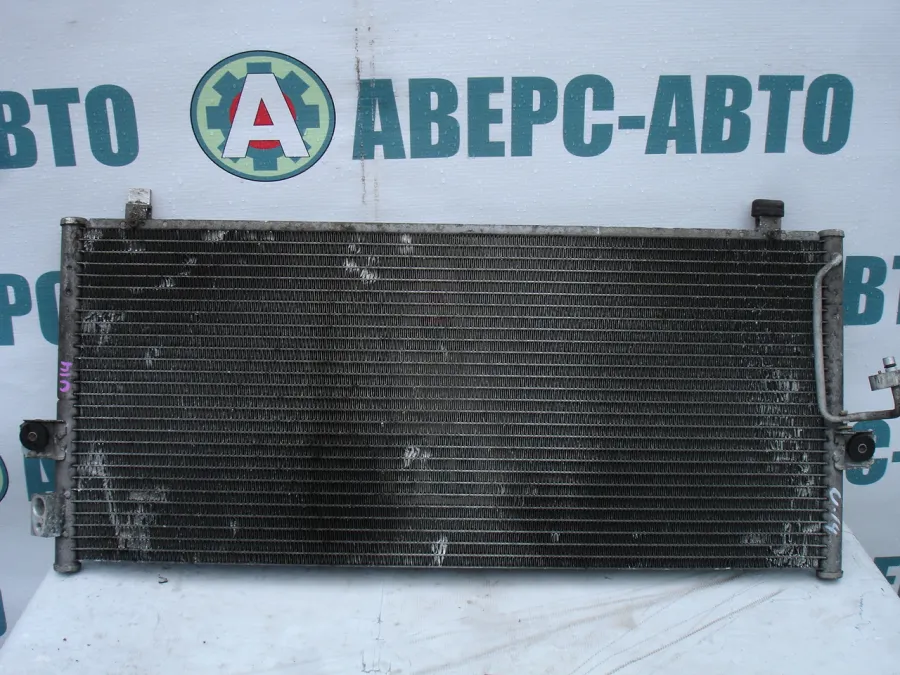 Радиатор кондиционера Nissan Bluebird EU14
