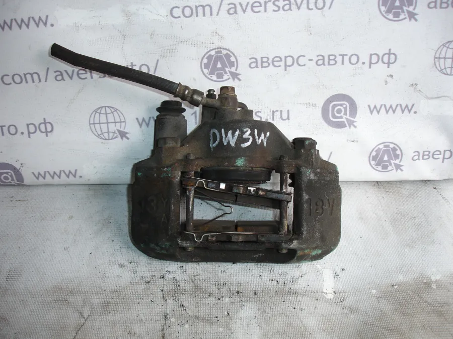 Суппорт правый передний Mazda Demio DW3W