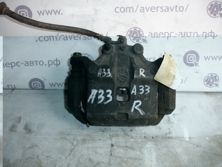 Суппорт правый передний Nissan Cefiro PA33