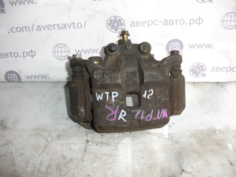 Суппорт правый передний Nissan Primera WTP12