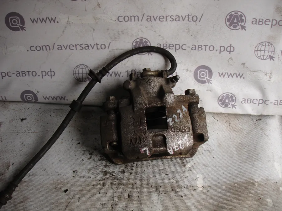 Суппорт Передний левый Mitsubishi Colt Z27A