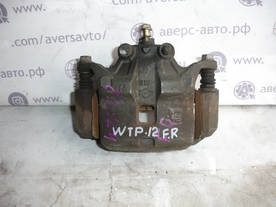 Суппорт правый передний Nissan Primera WTP12